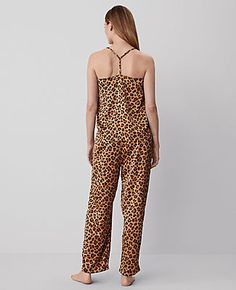 Unleash your wild side in style with the Ann Taylor Animal Print Tank and Pant Set. This ensemble is perfect for those who appreciate comfort without compromising on style.

- **Size:** XS
- **Color:** Tan
- **Material:** 100% Polyester
- **Gender:** Female
- **Top Features:**
  - Square neckline
  - Spaghetti straps
  - Front length: 19 1/4 inches; Back length: 16 1/4 inches
- **Pants Features:**
  - Elasticized waistband
  - Inseam: 27 inches
- **Care Instructions:** Machine washable

Crafted Leopard Print Sleepwear For Summer Loungewear, Fitted Leopard Print Sleepwear For Loungewear, Summer Leopard Print Loungewear Pants, Summer Loungewear Leopard Print Pants, Leopard Print Loungewear Pants For Summer, Leopard Print Pants For Summer Loungewear, Taylor Animal, Blazer And Skirt, Sleepwear & Loungewear