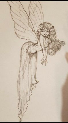 a pencil drawing of a fairy with wings