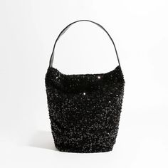 Elevate Your Style with Luxury Sparkling Sling Hobo Evening Purse Get ready to dazzle and shine with our Luxury Sparkling Sequin Ladies Sling Hobo Evening Purse! This exquisite handbag is a true fashion statement, designed to make you stand out in any crowd. With its glittering sequin exterior and big fashion bucket shopper tote design, it's the perfect accessory for trendsetters. Key Features: Versatile Occasion: This purse is perfect for a wide range of occasions, from glamorous evening parties to casual outings with friends. Interior Organization: It features a convenient cell phone pocket and interior zipper pocket to keep your essentials organized and easily accessible. Soft and Stylish: The soft construction of this hobo purse makes it comfortable to carry, while the sequined decorat Black Rectangular Bucket Bag For Party, Glamorous Evening Bucket Bag, Glamorous Evening Shoulder Bag With Sequins, Black Shoulder Bag For Summer Party, Evening Glitter Shoulder Bag, Glamorous Evening Glitter Shoulder Bag, Black Summer Party Bag, Black Party Bag For Summer, Glamorous Bucket Evening Bag