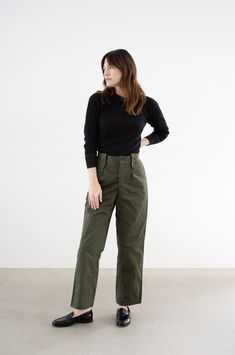 These olive green pants feature a straight tapered leg, button fly, two front pockets, two back flap pockets, belt loops. High-Rise. Unisex. Faded crease lines from long term storage. Some are a slightly more "Washed" green.  Maker: Military  |  Material: 100% Cotton Herringbone Twill Condition: Great! Washed Deadstock. A few faint marks on the back. Measurements:  Waist: 28"  |  Rise: 12"  |  Hips: 37"  |  Thigh: 11.75" flat  |  Inseam: 26-29"  |  Leg Opening: 8.25" Waist: 29"  |  Rise: 12"  | Olive Green Cropped Pants Outfit, Military Green Pants Outfit, Olive Green Trousers Outfit, Green Army Pants, Army Green Pants Outfit, Chinos Women Outfit, Army Pants Outfit, Green Trousers Outfit, Green Jeans Outfit