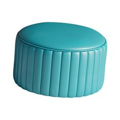 a round blue ottoman with pleated sides