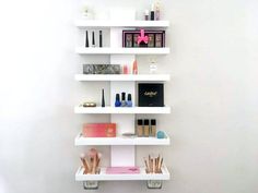 "Sleek Stylish Wall Mounted Shelf Perfect for cosmetics, perfumes, lotions, oils etc... Made to order. Ships out within 4-6 weeks. SPECS: - This listing is for the makeup organizer & two glass makeup brush holders. - Made of premium and poplar wood - Total Measurements 34\" tall x 19.5\" wide - Six total shelves (tiered) - 1st shelf has a 2\" depth - 2nd & 3rd shelf have a 3\" depth / 3 & 4\" height - 4th shelf has a 4\" depth / 6\" height - 5th shelf has a 5\" depth / 6\" height - 6 Makeup Storage Wall, Wall Mounted Makeup Organizer, Glam Room Decor, Makeup Shelf, Makeup Palette Organization, Palette Organizer, Makeup Shelves, Brush Holders, Storage Wall