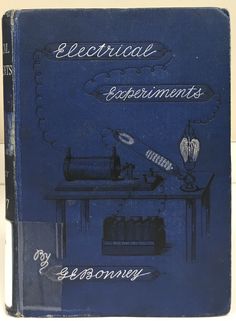 an old blue book with writing on the front and back cover that says electrical experiments