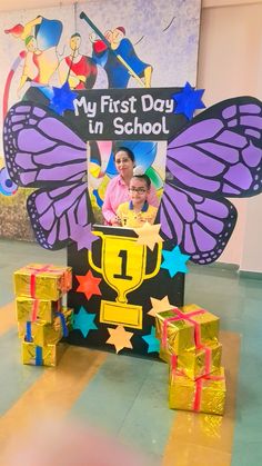 the first day in school display is decorated with gold and purple