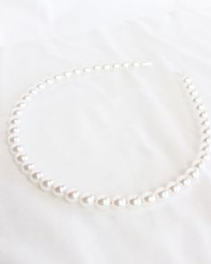 Experience timeless elegance with the Chic Babe Pearl Headband! This thin headband, adorned with pearls, adds a touch of sophistication to any outfit!! Elevate your style with this chic accessory! Pearl Border, Epic Costumes, Headband Pearl, Perfume Scents, Beaded Headband, Head Bands, Pearl Headband, Head Band, Chic Accessories