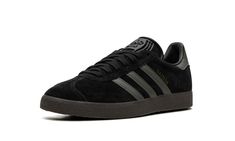 Gazelle ID6105 Adidas Gazelle Black And White, Cheap Black Adidas Sneakers, Black Gazelle, Adidas Gazelle Black Leather, Goitered Gazelle, Adidas Gazelle Black, Adidas Shoes Gazelle, Black And Gold Shoes, Gold Adidas