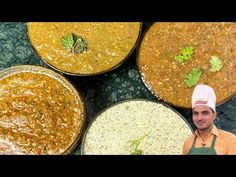 a man standing in front of four bowls filled with food