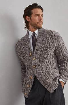 The manufacturing of the refined virgin wool and cashmere yarn enhances the noble qualities of the natural fibers to provide a lightweight and cozy sensation when worn. The craftsmanship of the knop yarn enriches the material’s texture with the characteristic mottled color. Horn button closure Patch hand pockets Unstructured shoulder Cable knit Alternative Mens Fashion, Retro Lines, Mens Knitwear, Shoulder Cable, Tweed Cardigan, Buttoned Cardigan, Cardigan Brown, Brown Cardigan, Cashmere Yarn