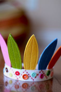 a close up of a paper crown on a table