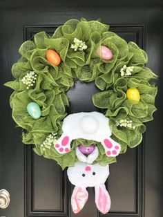 a wreath with an easter bunny on it