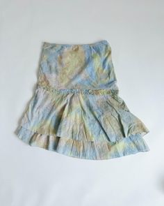 Awesome watercolor asymetric cut layered skirt. Cool piece to add some vintage feel to your outfit. No material label. Size M/L. Stretchy waist, measured laid flat 15inch. Model usually wears size UK14/EU42/L for biggest high street brands and is 167cm tall. Great condition, keep in mind that it is vintage item and signs of natural wear/age might appear. If you have any questions about item don't hesitate to message us.  When buying from HungerVintage you support small sustainable bussiness.  Th Spring Tie-dye Tiered Skirt, Watercolor Embroidery, Mens Wool Coats, Embroidery Skirt, Street Brands, Small Clothes, Layered Skirt, Blouse Patterns, Wool Coat