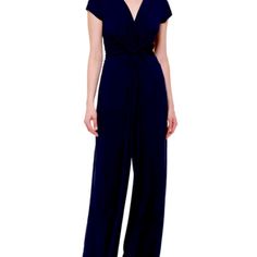 Navy Blue Jumpsuit, V Neck, Twisted Front, Flared Legs, Very Flattering. Can Be Dressed Up Or Down. Never Worn. Formal Solid Short Sleeve Jumpsuits And Rompers, Formal Short Sleeve Jumpsuits And Rompers, Formal Short Sleeve Jumpsuit Or Romper, Elegant Short Sleeve Formal Jumpsuits And Rompers, Elegant Fitted Blue Jumpsuits And Rompers, Elegant Blue V-neck Jumpsuits And Rompers, Elegant Blue Stretch Jumpsuits And Rompers, Formal Fitted Blue Jumpsuits And Rompers, Jumpsuit V Neck