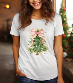 Coquette Colorful Christmas Tree Comfort Colors, Faux Glitter,Girls Christmas Tree Tee,Christmas Coquette Bow,Brushstroke Christmas Tree Tee PRODUCT FEATURES Comfort Shirts 1717 features 6.1 ounce, 100% ring spun U.S. cotton, 20/1 Topstitched, classic width, rib collar Double-needle stitching on armhole, sleeves and bottom hem Twill taped neck and shoulder Soft-washed garment-dyed fabric Pigment shades naturally vary, tubular body, relaxed fit, twill label How Do I Order 1- Please review all the information provided before placing an order 2- Select the item type and size using the drop down menu.  3- Select the color of the item using the following drop down menu. 4- Please add the design color (white or black) in the optional message section of the order. 5- Need more Items? Add the curr Cute Christmas Festive Tops, Cute Festive Christmas Tops, Tree Tshirt, Come Let Us Adore Him, Christmas Coquette, Tee Tree, Christmas Tshirt, Glitter Girl, Religious Christmas