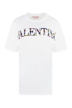 Indulge in the luxurious comfort and style of this exquisite embroidered t-shirt. Crafted from premium white cotton jersey, this short-sleeved crewneck t-shirt features a stunning multi-color sequined Valentino embroidery that adds a touch of glamour and sophistication to any outfit. Whether you're dressing it up with a chic skirt or keeping it casual with your favorite jeans, this t-shirt is a versatile must-have for any fashion enthusiast. Material: Cotton Jersey Design: Multi-color Sequined V Valentino Embroidery, Valentino Logo, Chic Skirt, Influential Women, Chic Skirts, Mens Designer Shoes, Fashion Enthusiast, Valentino Women, Jersey Design