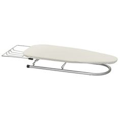 a white ironing board sitting on top of a metal rack