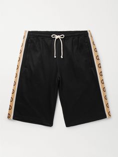 Alessandro Michele has made tracksuits a staple in Gucci's offering. Just like retro sportswear, these tech-jersey shorts are trimmed with reflective piping and webbing woven with the house's monogram at the side seams. Wear them with one of the brand's printed tees. Gucci Shorts, Gucci Collection, Retro Sportswear, Gucci Outfits, Gucci Sneakers, Gucci Black, Drawstring Shorts, Mr Porter, Fashion Killa