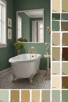 the bathroom is painted in shades of green, brown and beige with white trims