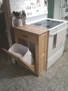 a kitchen with an oven and sink in it