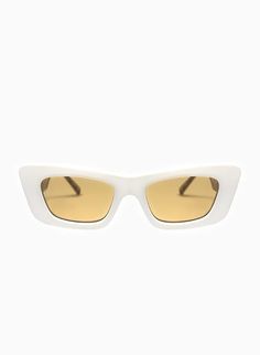 Sculptural and feminine, the Zoe sunglasses pair important volumes with a classic and timeless design. The bold frames, defined by clean cuts and pointed angles, and the soft gradient lenses create a glossy, contemporary, and enduring pair of sunglasses. Details + Fit Frame: Cateye Color: Cream with Tortoiseshell Temples Lens: Light Brown #CAT2 100% UV Protection Comes with a Soft Cream Vegan Case Classic Cat Eye Sunglasses In Optic White, Chic Optic White Sunglasses With Gradient Lenses, Chic Optic White Polarized Sunglasses, Chic Optic White Sunglasses With Polarized Lenses, Chic Optic White Cat Eye Sunglasses With Mirrored Lenses, Chic Optic White Cat Eye Sunglasses With Polarized Lenses, Modern White Cat Eye Sunglasses With Gradient Lenses, Modern White Square Frame Cat Eye Sunglasses, Modern Optic White Cat Eye Sunglasses With Gradient Lenses