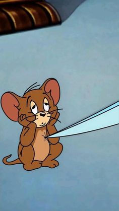 a cartoon mouse is holding a large knife