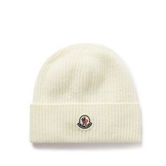 Moncler's beanie is simply detailed with the French brand's logo. Designed to last, it's rib-knitted from a soft, insulating virgin wool and cashmere-blend that'll keep you warm whether you're on the slopes or around town. Classic Cream Hats With Embroidered Logo, Designer Beanie For Winter, Classic White Beanie For Winter, Classic White Wool Hat, Classic White Hat With Logo Patch, Classic White Winter Beanie, Classic Fitted Wool Beanie, White Winter Hat With Embroidered Logo, Luxury Men's Beanie Hat