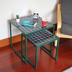 two tables with books and cups on them