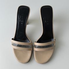 Early 2000's vintage Gucci slip-on mules with clear PVC strap detail and clear acrylic on the heels Marked size EU 35 Fits like a US 6/6.5 Insole: 23 cm (9") Heel: 8 cm (3") Clogs And Mules, Gucci Vintage, Slip On Mules, Leather Mules, Clogs Shoes, Cream White, Favorite Things Gift, Vintage Gucci, Clear Acrylic