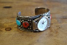 "Beautiful vintage sterling silver watch cuff with turquoise and coral stones. The inside circumference measures 5.5\", plus an additional 1 3/8\" gap. Will fit a wrist size 6.5 to a 7 comfortably. Signed \"Sterling\" and hallmarked \"AJ\". Two coral and four turquoise cabochons with stamped design. Gorgeous vintage piece! Feel free to ask any questions and thank you for looking! BT-2" Turquoise And Coral, Cuff Watch, Sterling Silver Brooch, Coral Stone, Vintage Navajo, Statement Bracelet, Silver Brooch, Vintage Turquoise, Turquoise Sterling Silver