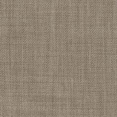 an upholstered beige fabric textured with small squares