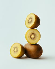 kiwi fruit stacked on top of each other