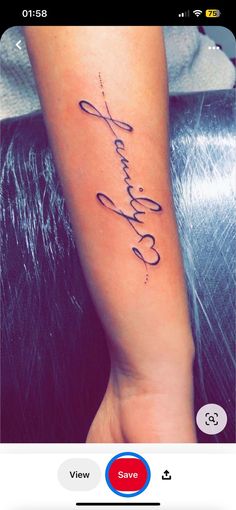 a woman's wrist tattoo with the words, love and faith on it in cursive writing