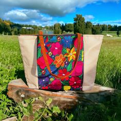 Colorful floral pattern tote bag made by Guatemalan artisans. Very convenient and spacious to carry everyday items.  *zipper closure *2  small outer pockets pocket inside Disclaimer: Due to the nature of the product imperfections might be expected and appreciated. Multicolor Floral Print Tote Beach Bag, Multicolor Floral Print Canvas Bag For Everyday, Bohemian Multicolor Floral Print Bag, Multicolor Floral Print Tote Canvas Bag, Multicolor Floral Print Canvas Tote Bag, Bohemian Tote Shoulder Bag With Floral Print, Bohemian Shoulder Bag With Floral Print Tote, Bohemian Floral Print Tote Shoulder Bag, Bohemian Floral Print Bags For Vacation