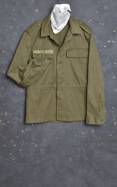 Lovely Vintage Army Jacket in Green Looks like Size Medium  Great military jacket made from high quality cotton twill Classic shape, button down front, nice collar Two deep buttoned flap chest pockets and two deep buttoned flap chest on back Buttoned cuffs Condition - Great vintage condition, some signs of wear, will age beautifully with time and use to get personal patina, might have some storage marks, with plenty of life left to give! PLEASE CHECK ALL MEASUREMENTS, THANK YOU!  Pit to Pit: 22" Military Cotton Utility Jacket With Collar, Military-style Cotton Utility Jacket With Collar, Military Style Cotton Utility Jacket With Collar, Military Cotton Collared Utility Jacket, Military Cotton Outerwear For Work, Military Style Cotton Outerwear For Work, Long-sleeved Uniform Outerwear With Pockets, Uniform Style Long Sleeve Outerwear With Pockets, Uniform Style Outerwear With Pockets