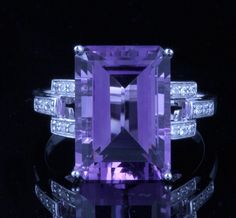 This is a Gem Quality 14K White Gold HUGE Amethyst and Diamond Vintage Ring. I just recently aquired this piece and I did not know very much about it. I knew it was Beautiful and was designed Extremely well, but I wanted to know more. So I sent away for an appraisal. Appraisals are a lot of money and I do not do this very often, but I was curious. Well, I found out a lot! First of all, this Stone is MUCH larger than I originally thought. It is a Whopping 17.52 Carats It did not look that large t Luxury Purple Rings Gia Certified, Luxury Purple Gia Certified Rings, Luxury Emerald-cut Amethyst Ring For Formal Events, Luxury Emerald Cut Amethyst Ring For Formal Occasions, Luxury Vvs Clarity Amethyst Ring For Formal Occasions, Formal Purple Amethyst Ring With Vvs Clarity, Elegant Octagon Amethyst Ring For Formal Occasions, Octagon-shaped Amethyst Ring For Formal Occasions, Octagon Amethyst Ring For Formal Events