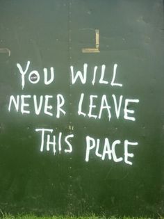 a sign that says you will never leave this place