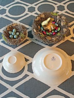 an arrangement of dishes and bowls with eggs in them