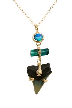 Gold & Stone Necklace - A flashy, blue-green Australian opal pairs perfectly with a natural teal tourmaline, set with a bright white diamond and fossilized shark tooth with tiny, hand-carved scallop shell detail. Set into hand-carved 14k gold, the three elements hang and swing separately from each other, offering playful movement to this statement piece. Springring clasp closure. Gold Stone Necklace, Shark Tooth Pendant, Tooth Pendant, Shark Necklace, Scallop Shell, Shark Tooth, Tiny Hand, Shark Teeth, Gold Stone