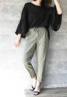 A pair of high-waisted tapered pants can never ever go out of fashion. You can get them in different patterns and colours to style your looks. They are versatile enough to be paired with heels or flip-flops and at the same time, they are super comfy to carry on in the daily routine. Different Types Of Bottom Wear For Women, Bottom Wear For Women, Pants Types