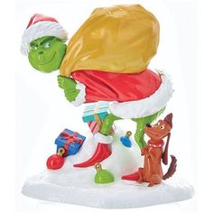 the grinch statue is wearing a santa hat and carrying presents on his back,