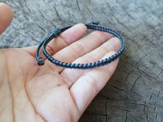 This unisex bracelet or anklet made with waxed cord and sliding knotted for closure, 4mm in width. The Black cord is in the middle, You can change the side cord color. *Size: Choose your size or color cord from the drop-down menu. *✈️ Shipping.. The item shipped by Registered Airmail Thailand Post within 3-5 working days after payment received. - United States and Europe: It's will take about 2-4 weeks to delivery after shipping. - Asia : It's will take about 1-2 weeks to delivery after shipping Minimalist Braided Bracelets With Adjustable Waxed Cord, Minimalist Braided Bracelets With Adjustable Cord, Gift Leather Bracelet With Adjustable Waxed Cord, Casual Leather Bracelet With Sliding Knot As Gift, Minimalist Adjustable Leather Bracelet, Casual Braided Bracelet With Adjustable Cord As Gift, Casual Leather Bracelet With Adjustable Length As A Gift, Casual Black Leather Bracelet With Sliding Knot, Casual Braided Bracelets With Sliding Knot In Waxed Cord