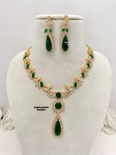 American Diamond Necklace Set in gold color/CZ Necklace/ Reception Jewelry/gold base/green  All items are shipped from Brampton, Ontario, Canada. If you need your item by a certain day, please reach out to us for express delivery option so that we can update shipping for you before you place the order.  Standard shipping/delivery timeline Below are the delivery timeline estimates. We dispatch all orders by the next business day. ---> USA delivery timeline * 3-6 business days to major urban cente Formal Green Emerald Diamond Necklace, Green Jeweled Necklaces For Anniversary, Green Emerald Bridal Necklace Gift, Green Jeweled Necklace For Anniversary, Green Emerald Bridal Necklace For Wedding, Elegant Green Bridal Necklace For Formal Occasions, Green Emerald Jewelry Sets For Wedding, Green Emerald Wedding Jewelry Sets, Formal Green Jewelry With Hand Set Details