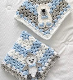 two crocheted squares with teddy bears on them, one is blue and the other is white