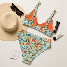 Inspired by the vibrant patterns of Mexican Otomi art, our Recycled High-Waisted Bikini features a striking print against a sleek light green backdrop. Dive into sustainable fashion while lounging poolside or catching waves at the beach. With its flattering high-waisted style and eco-conscious materials, this bikini blends style with environmental responsibility. Get ready to turn heads and embrace Mexican heritage with every splash! It’s too easy to fall in love with this bikini set. Removable Green High-waist Tankini For Sunbathing, High Waist Green Tankini For Sunbathing, Festival Green Printed Swimwear, Multicolor High Waist Printed Swimwear, High Waist Multicolor Printed Swimwear, Multicolor Printed High Waist Swimwear, Multicolor Printed High-waist Swimwear, Green Printed Swimwear For Sunbathing, Green Printed Tankini For Beachwear