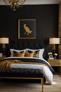 a bedroom with black walls and gold accents