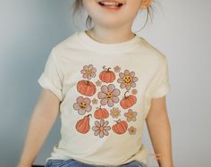 "All of the shirts and bodysuits at our shop are CPSIA compliant. We only use Eco-friendly, water-based inks that are also CPSIA compliant and boasts strong washability (highest score on AATCC wash test). So rest assure to put them on your little ones! ** COLOR OF T-SHIRTS WILL VARY SLIGHTLY DUE TO LIGHTING AND/OR MONITOR SETTINGS ** DETAILS OF ONESIES & T-SHIRTS MAY VARY SLIGHTLY FROM PRODUCT PHOTOS BASED ON AVAILABLE INVENTORY HOW TO ORDER: Please follow these 5 simple steps: 1. Select the sty Playful Cotton Shirt With Custom Print, Playful White Shirt With Custom Print, Playful White Soft-washed T-shirt, Playful Soft-washed White T-shirt, Kindergarten First Day, Pumpkin Season, Fall Tee, Product Photos, Smile Face