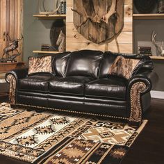 a living room filled with furniture and rugs