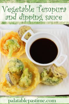 vegetable tempuras and dipping sauce on a white plate with a cup of coffee