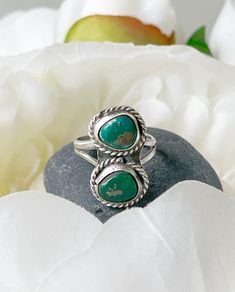 Old little ring with two dark green color turquoise stones. Stone size: about  1/4 of inch each Ring face: 1/2 x 3/4 of inch Ring size: 5  Weight: 4 grams No mark due to old age, but tested as sterling silver. Please see picture for details. Thank you for looking. Southwestern Style Green Turquoise Ring As Gift, Adjustable Green Turquoise Chrysocolla Ring, Nickel Free Green Bohemian Rings, Nickel-free Green Bohemian Rings, Bohemian Nickel-free Green Rings, Bohemian Green Nickel-free Rings, Bohemian Green Turquoise Ring For Anniversary, Green Turquoise Bohemian Ring For Anniversary, Bohemian Green Turquoise Anniversary Ring