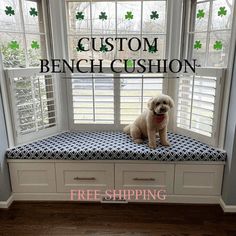 a white dog sitting on top of a window sill with the words custom bench cushion