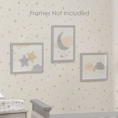 a baby's room with stars, moon and clouds on the wall